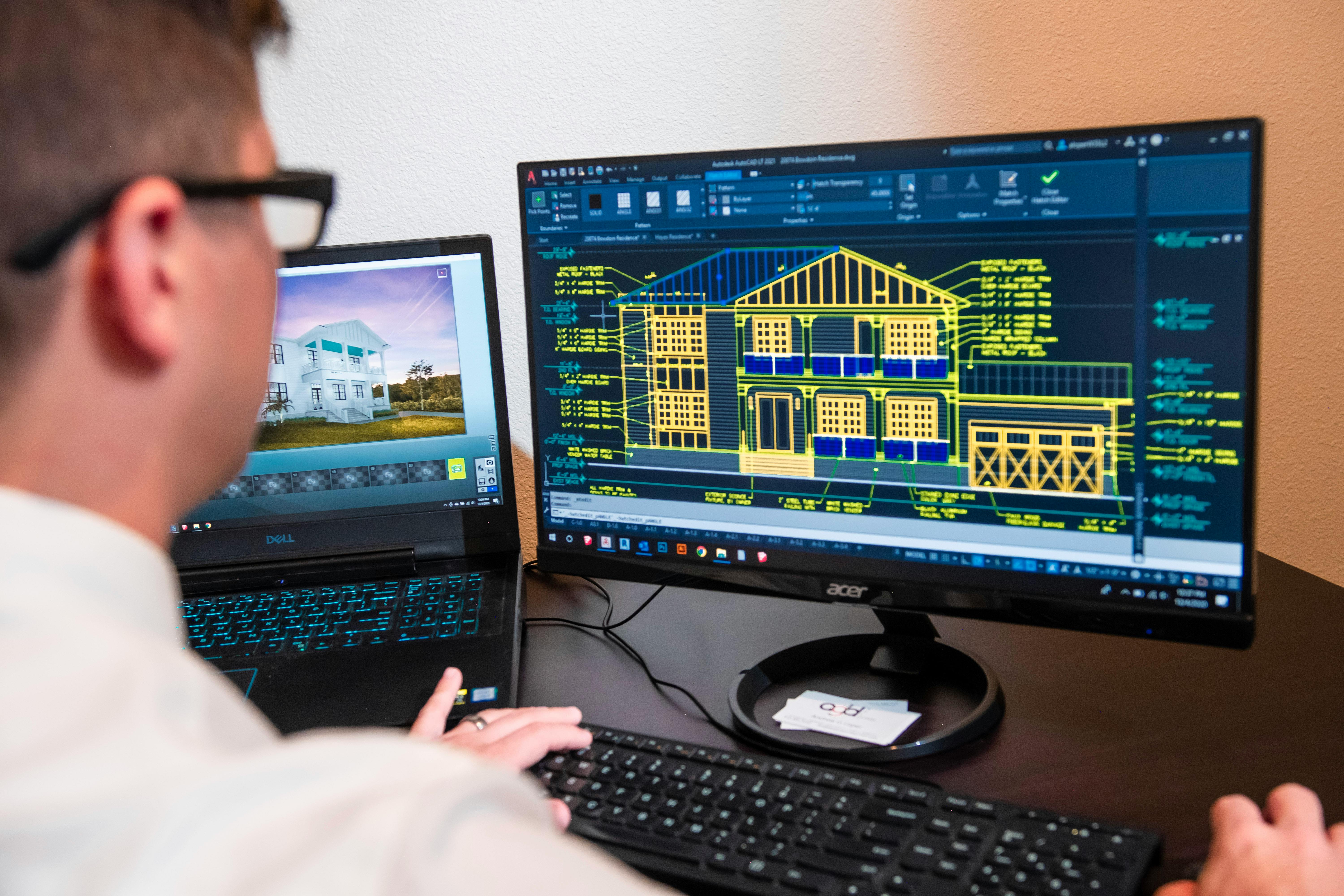 Header image person working on autocad drawing